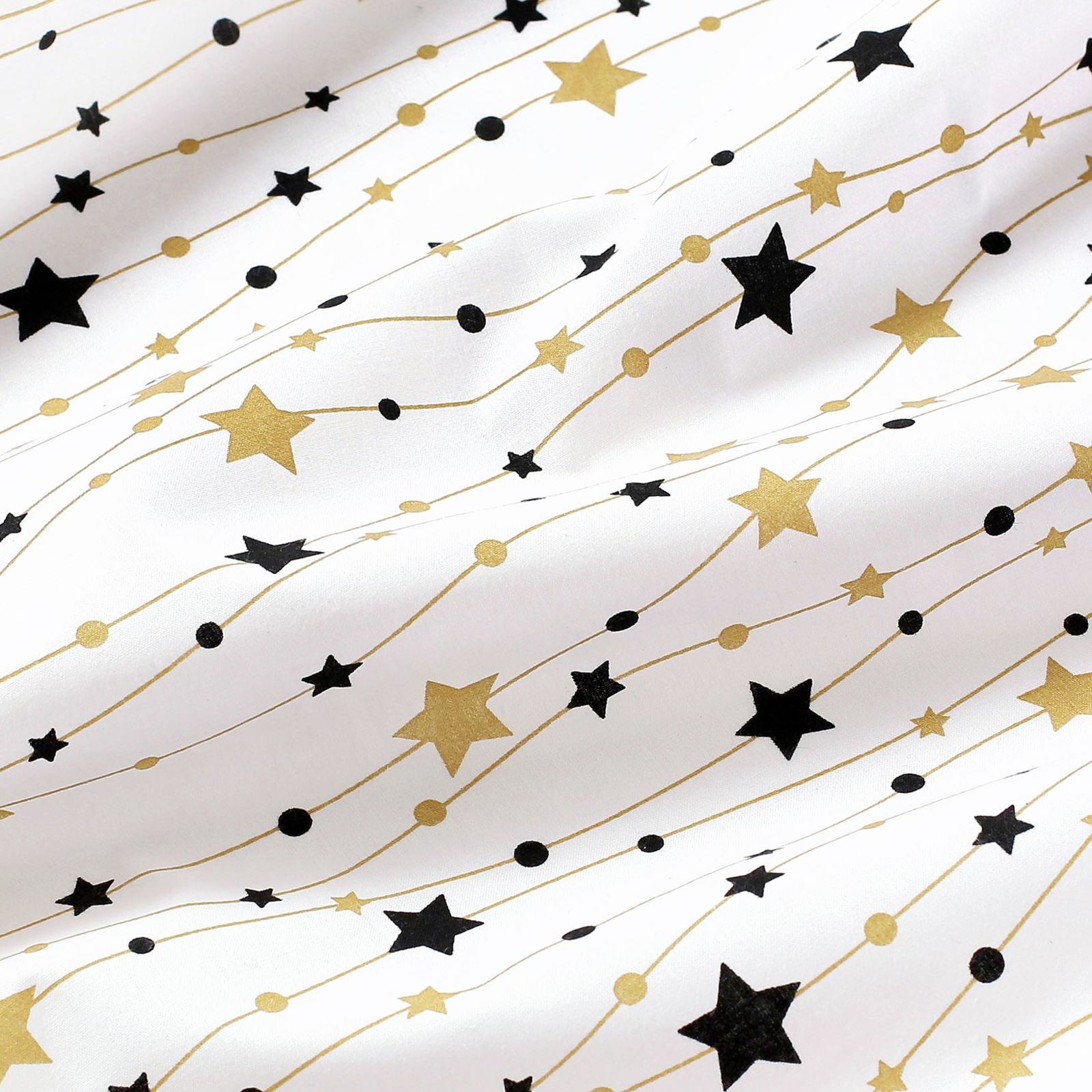 Țesătură din 100% bumbac  - steluțe aurii si negre pe alb