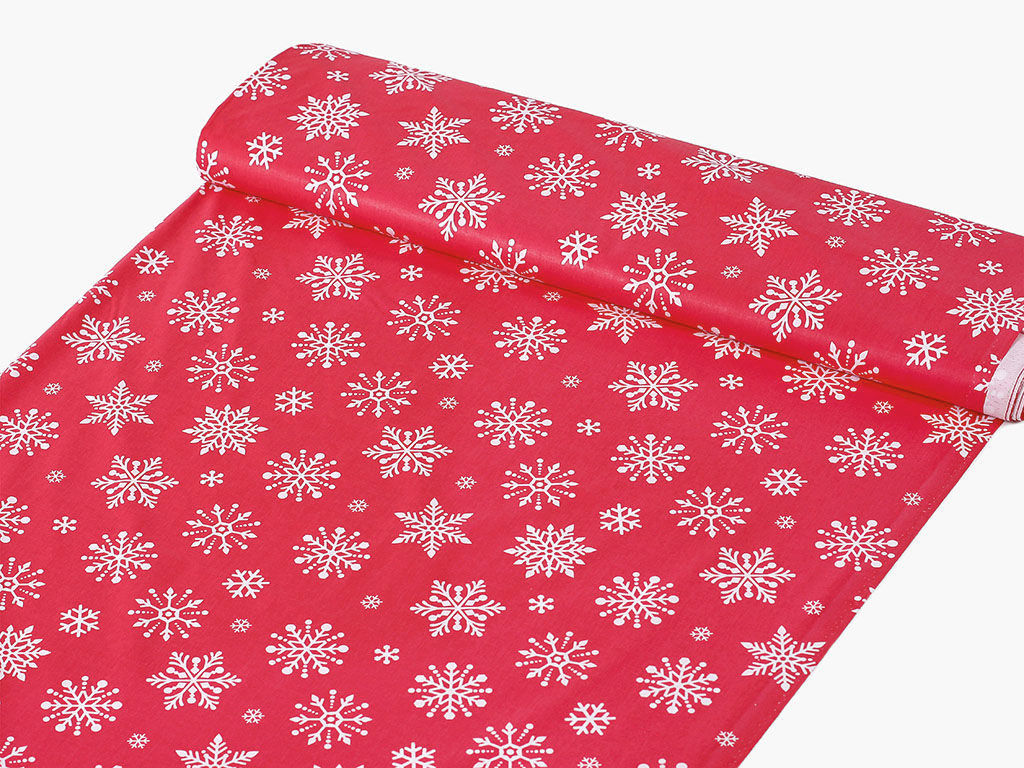 Țesătură din 100% bumbac SIMONA - model de Crăciun - fulgi de zăpadă pe roșu