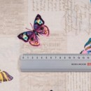 Țesătură decorativă LONETA - model 185 fluturași colorați - lățime 140 și 280 cm